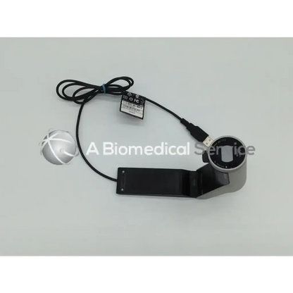 Black and silver handheld cisco tandberg ttc8-03 precision hd f1.7 50 degree view camera with usb cable and base plate