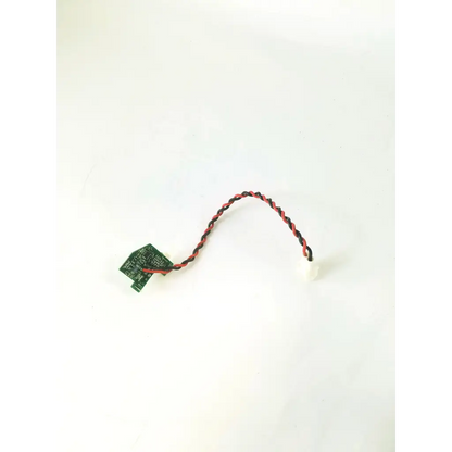 Red and black twisted wire cable attached to green rev c board clb-0002 rev with bbcb3-8c 22523sm component