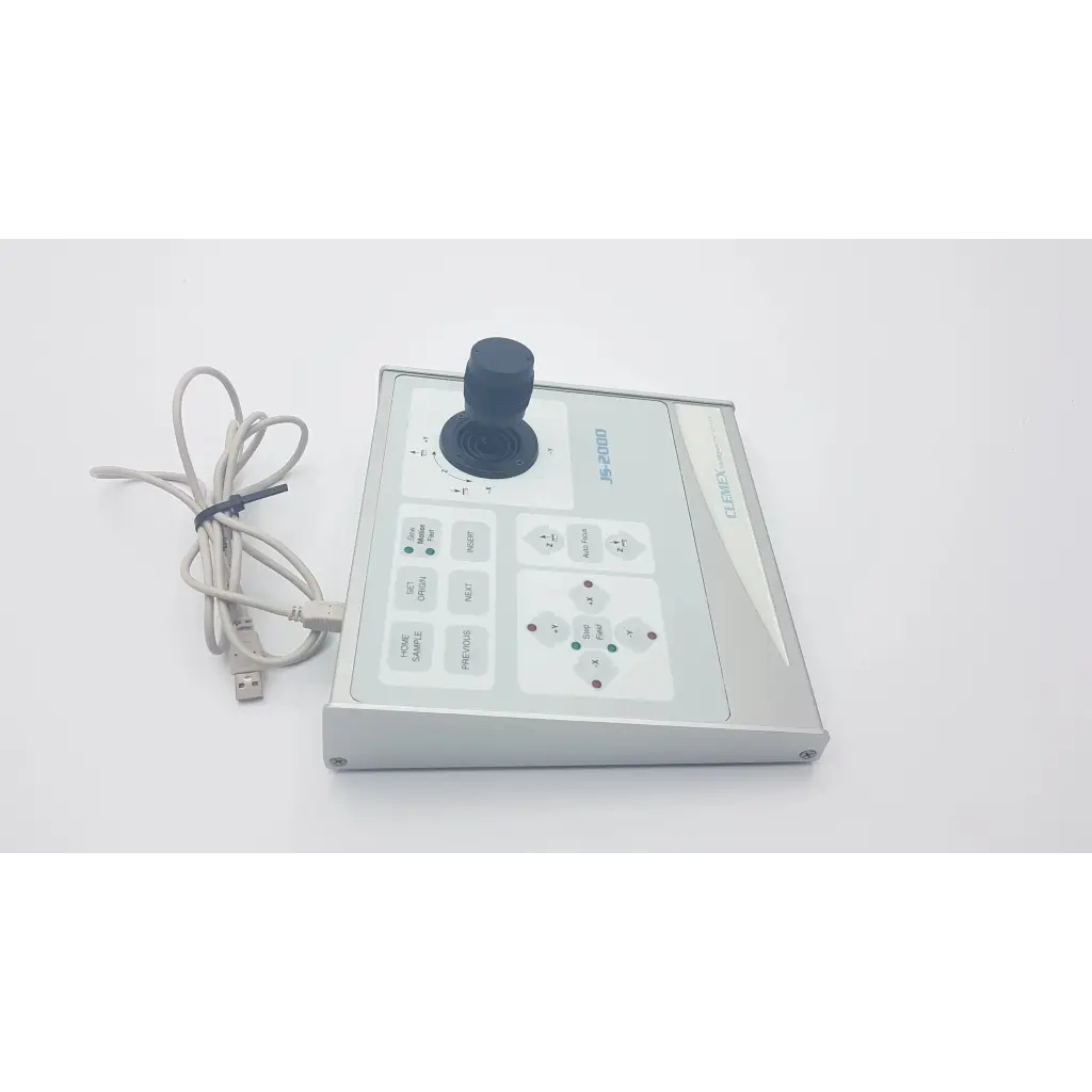 Silver clemex js-2000 microscope joystick controller with rectangular design black joystick and multiple labeled buttons