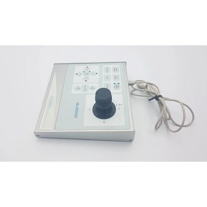 Silver clemex js-2000 microscope joystick controller with black joystick, labeled buttons, and attached coiled cable