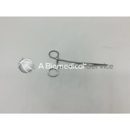 Silver codman 34-4130 rochester ochsner forceps with curved slender arms and circular handles for surgical use