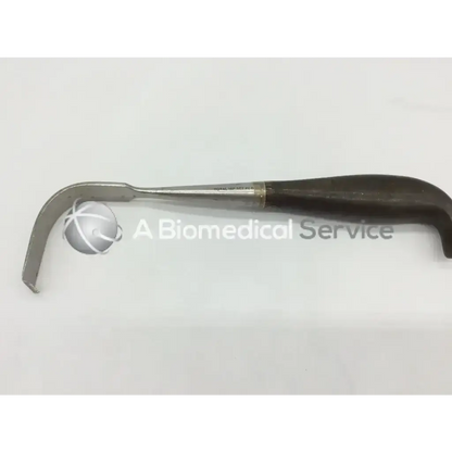 Codman 50-1065 curved metal laminectomy retractor total with dark wooden handle from total hip set 2 b