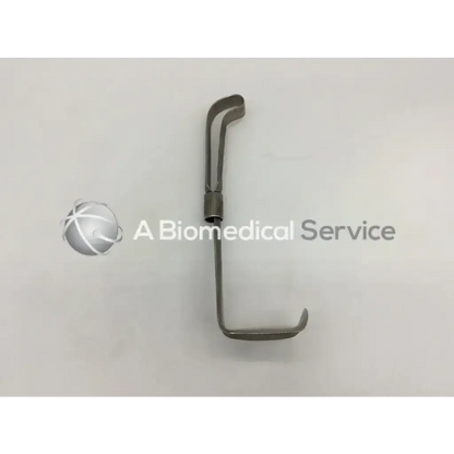 Stainless steel codman 50-4112 surgical retractor with curved l-shaped design and central pivot point for surgery