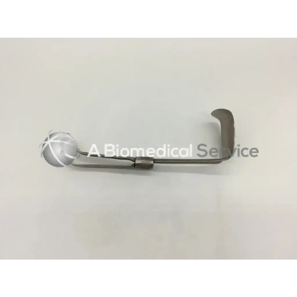 Silver codman 50-4112 surgical retractor with curved handle and translucent spherical end for precise retraction