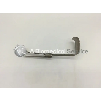 Silver codman 50-4112 surgical retractor with curved handle and translucent spherical end for precise retraction
