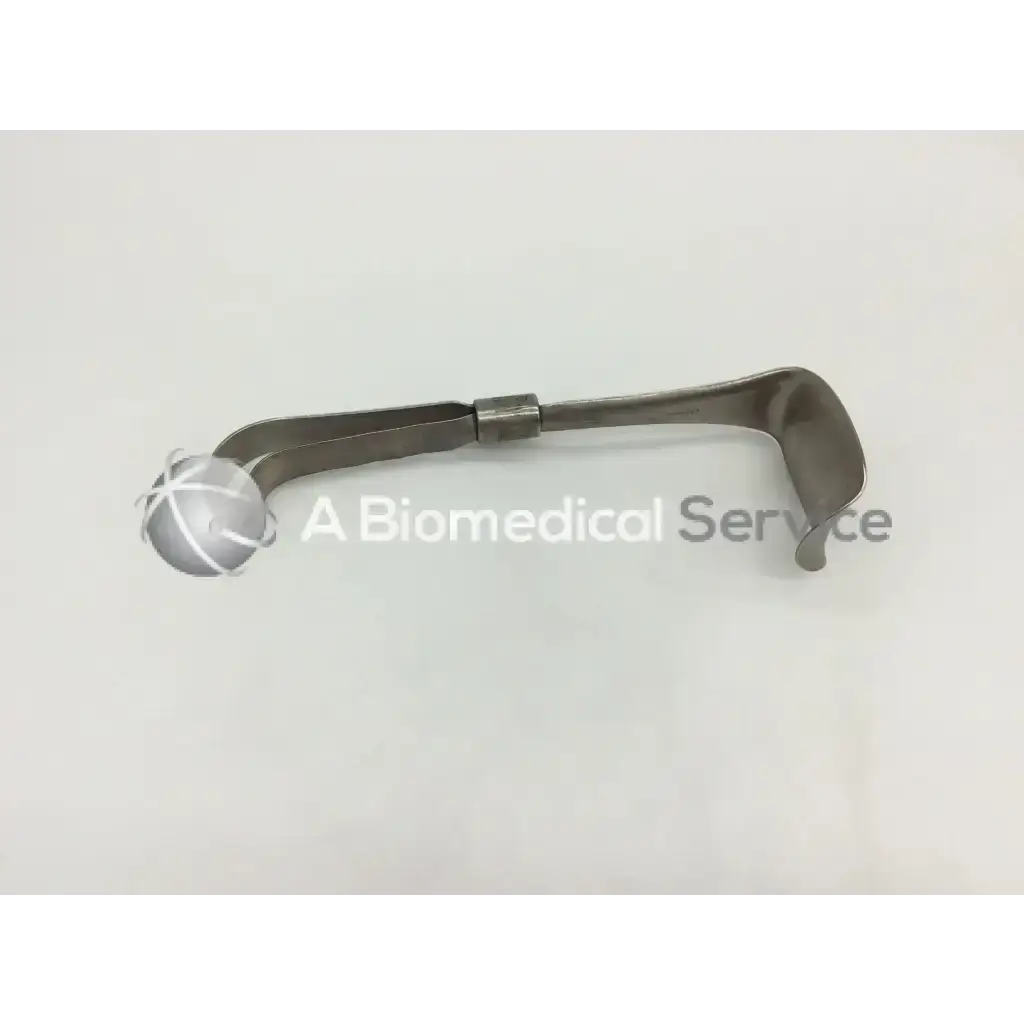 Silver metallic obstetrical surgical retractor codman 50-4112 with curved open-ended design for precise use