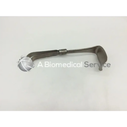 Silver metallic obstetrical surgical retractor codman 50-4112 with curved open-ended design for precise use