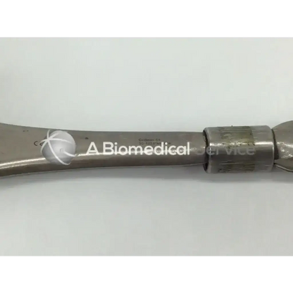 Silver metallic codman 50-4112 surgical retractor with engraved branding and textured grip for precise surgical use