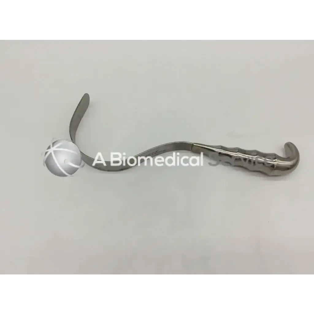 Codman 50-4316 deaver retractor stainless with curved textured handle and slightly bent smooth blade in stainless steel surgical design