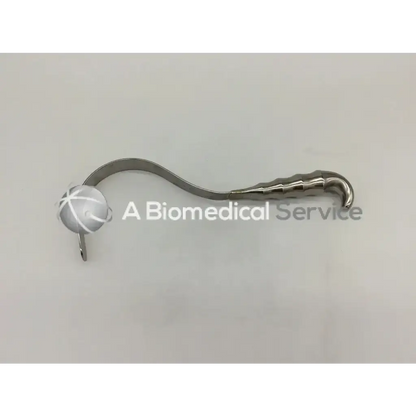 Silver codman 50-4316 deaver retractor stainless with curved textured handle and circular end in stainless steel surgical design