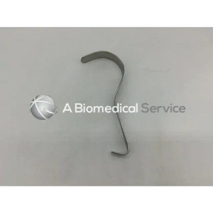 Silver-colored curved metal deaver retractor Codman 50-5631 with s-shape design for surgical use
