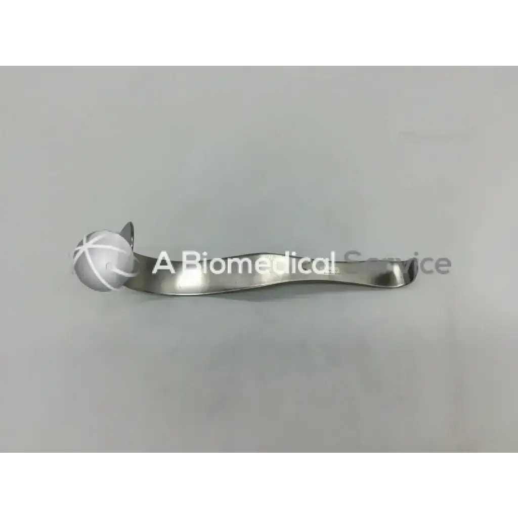 Silver codman 50-5631 deaver retractor with curved polished metal handle and spherical head with engraved crosshatch pattern