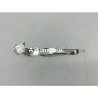 Silver codman 50-5631 deaver retractor with curved polished metal handle and spherical head with engraved crosshatch pattern