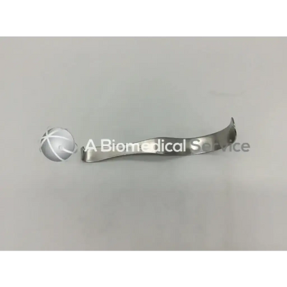 Silver metallic deaver retractor codman 50-5631 with curved elongated design and slightly textured surface for surgery