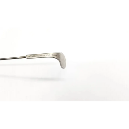 Silver-toned stainless steel codman 8509n surgical tool with polished curved blade and engraved markings