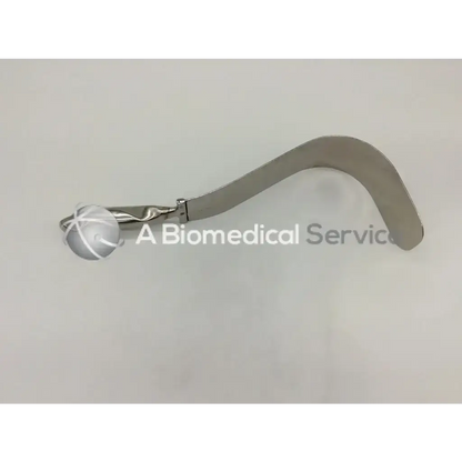 Silver-colored codman lamb handle retractor with curved polished metal design and spherical handle for surgery