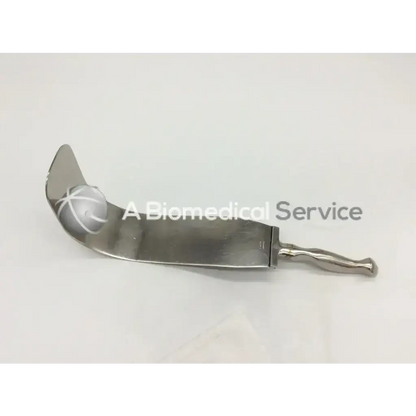 Silver surgical retractor with curved polished metal blade and ergonomic handle codman lamb handle 2390544 lamb handle