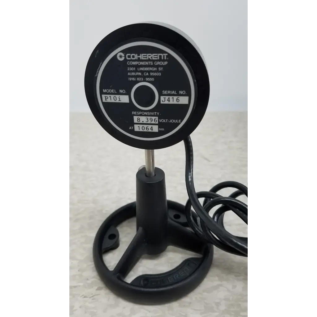 Black coherent labmaster+ laser power meter with circular dial and cable for precise laser power measurement