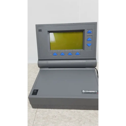 Gray coherent labmaster laser power meter with yellow screen and blue buttons for accurate laser power measurement