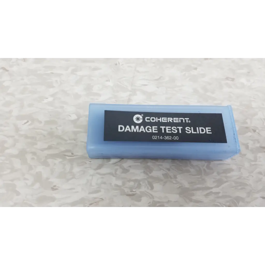 Light blue rectangular plastic damage test slide with black label for coherent labmaster plus laser power meter