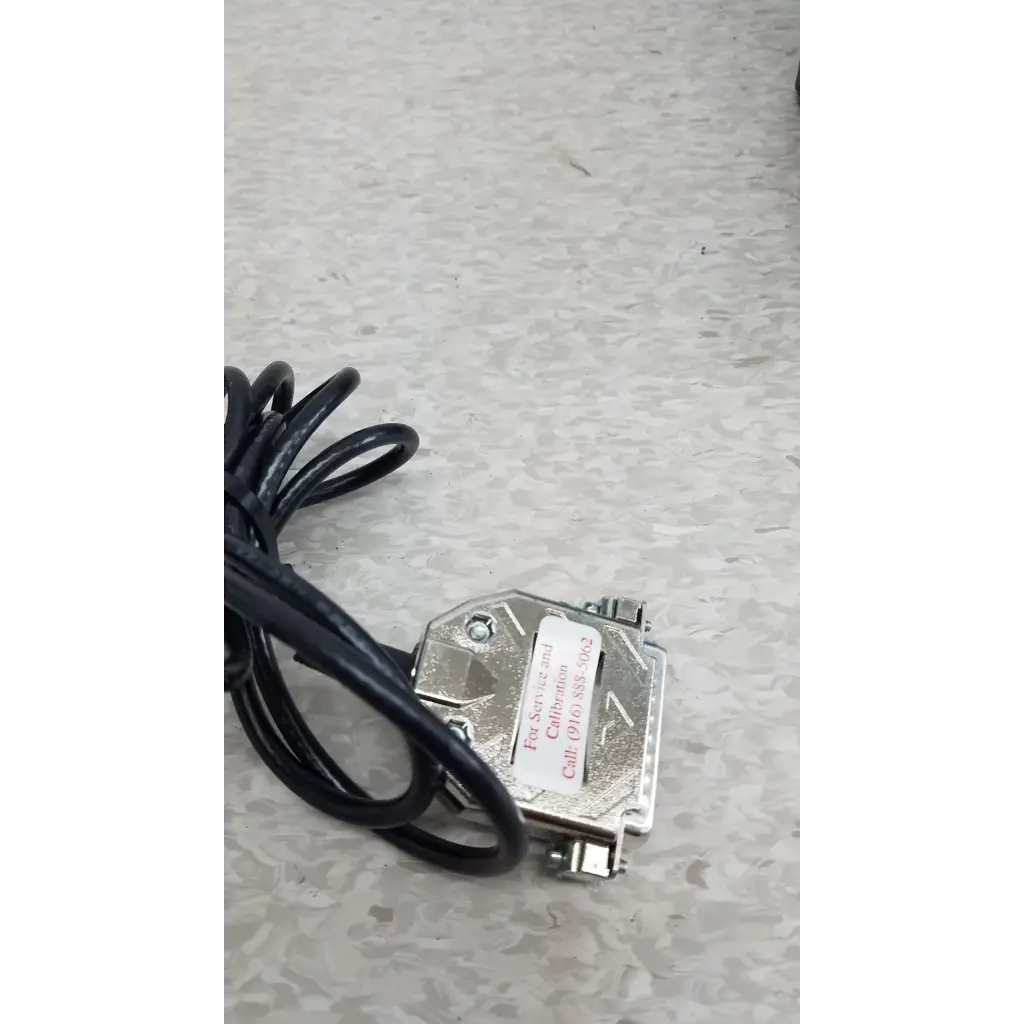 Coherent LabMaster+ laser power meter back with silver metallic d-sub connector and black coiled cable attached