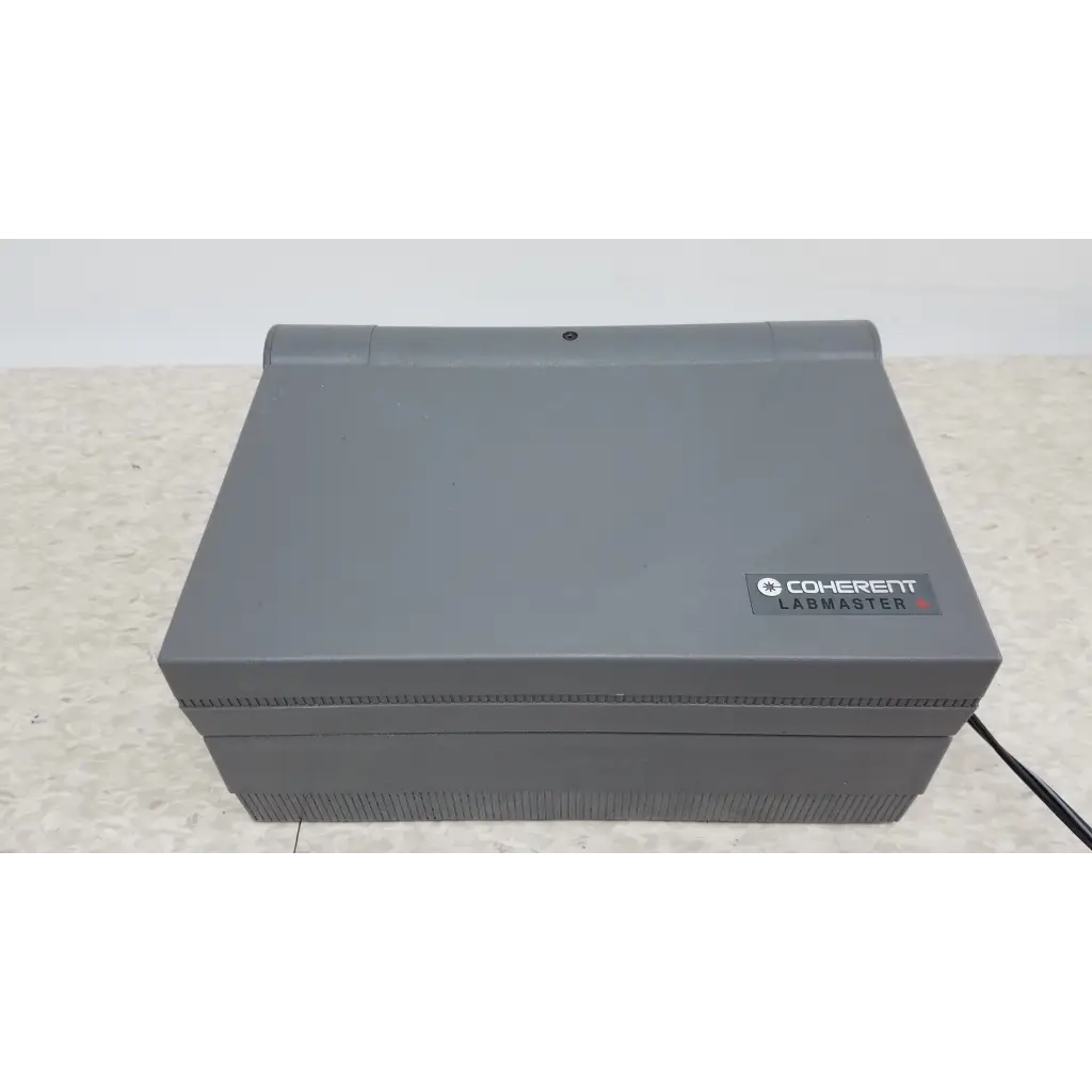 Gray coherent labmaster laser power meter with vented sides and two sensor heads for precise laser power measurement