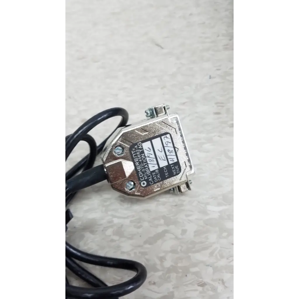 Silver metallic comberta vibration transducer with black cable and engraved labeling for coherent labmaster+ laser power meter