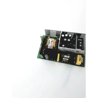 Silver metal power supply gpc80p with black and yellow components mounted on green circuit board for dc power use