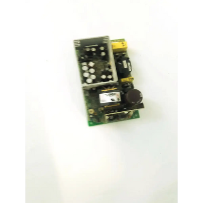 Green circuit board of condor gpm80p power supply with black and white components yellow connectors and silver heat sink