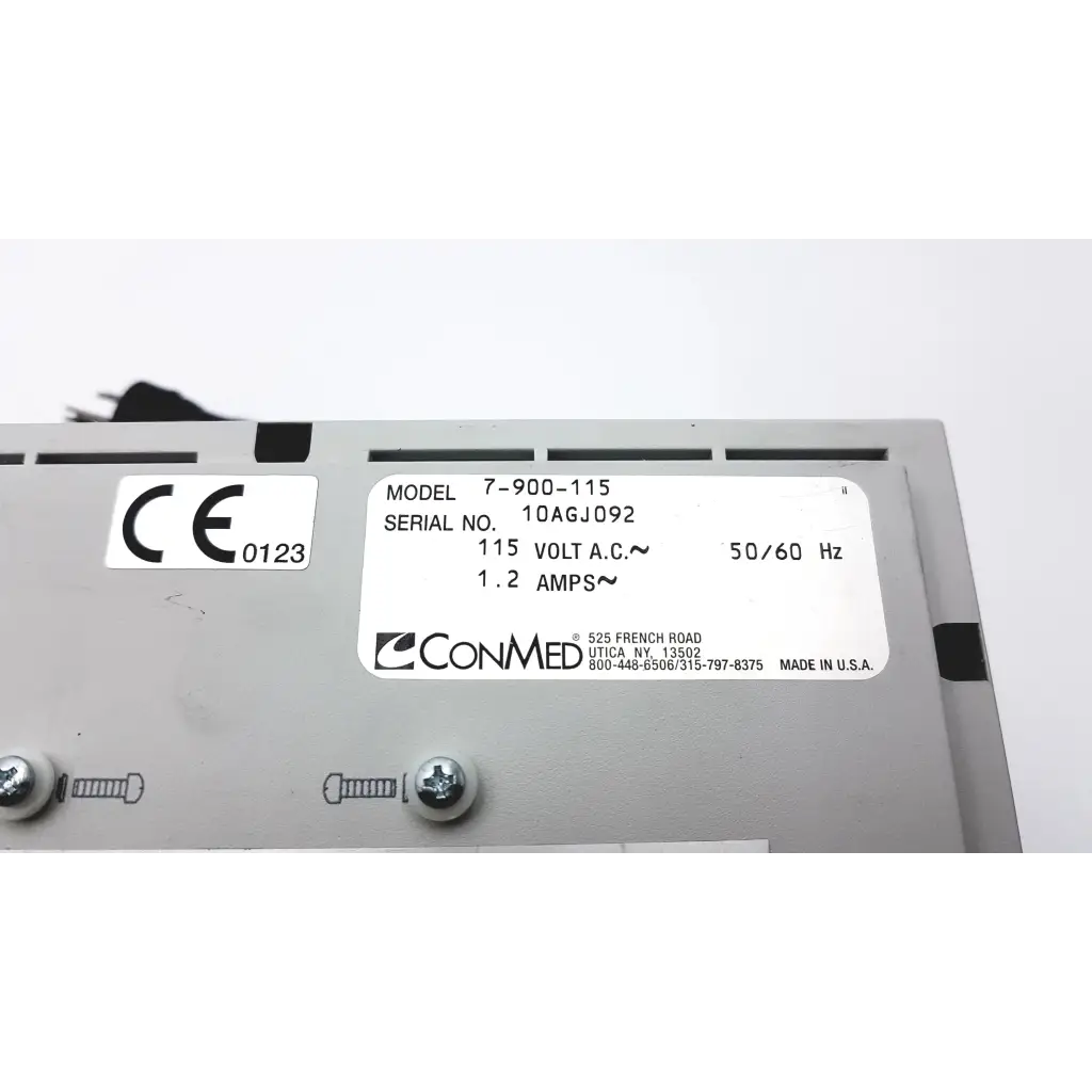 Gray metal conmed hyfrecator 2000 desiccator unit with push pencil handpiece and white label showing specifications