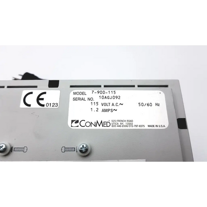 Gray metal conmed hyfrecator 2000 desiccator unit with push pencil handpiece and white label showing specifications
