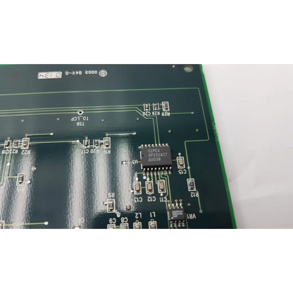 Green control interface circuit board pcb 140e51030 rev a with black integrated circuits and silver solder points