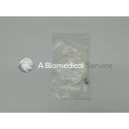 Clear flexible tubing with metallic connector packaged in plastic bag for cook medical exhaust line 652600 product