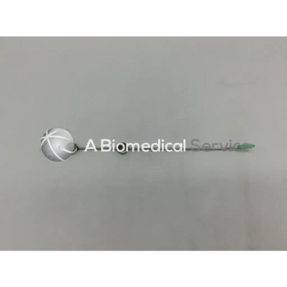 Silver spherical cook urological gyn surgical tool with green-tipped needle for obgyn surgical use