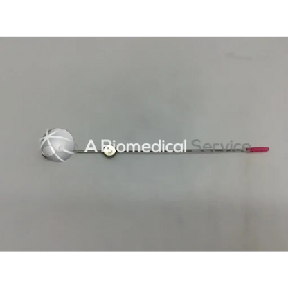 Cook urological gyn surgical tool with silver and pink spherical head featuring crosshatch detailing for obgyn use