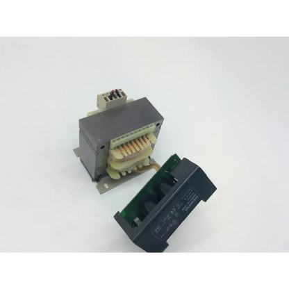 Black rectangular power supply unit with green circuit board and beige terminal connectors siemens 4av4110-2ab nsnp