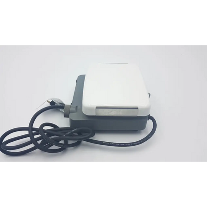 White and gray electric foot pedal with black power cord for corning magnetic laboratory stirrer pc-310 use