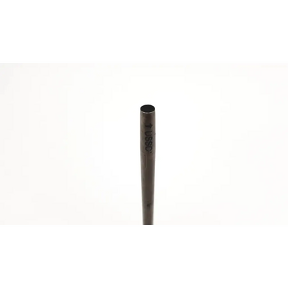 Black cylindrical metal rod with engraved markings of covidien 177792 versaport metal cannula close-up view