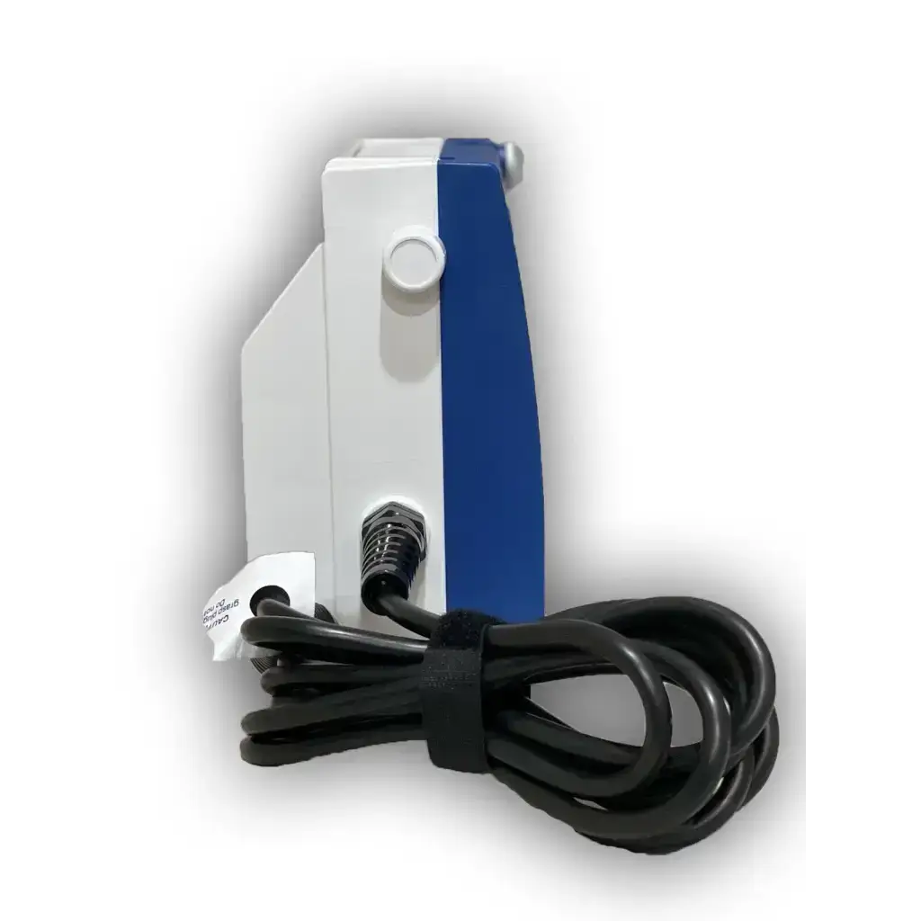 White and blue Covidien Kangaroo 924 enteral feeding pump with coiled black cable for enteral feeding use