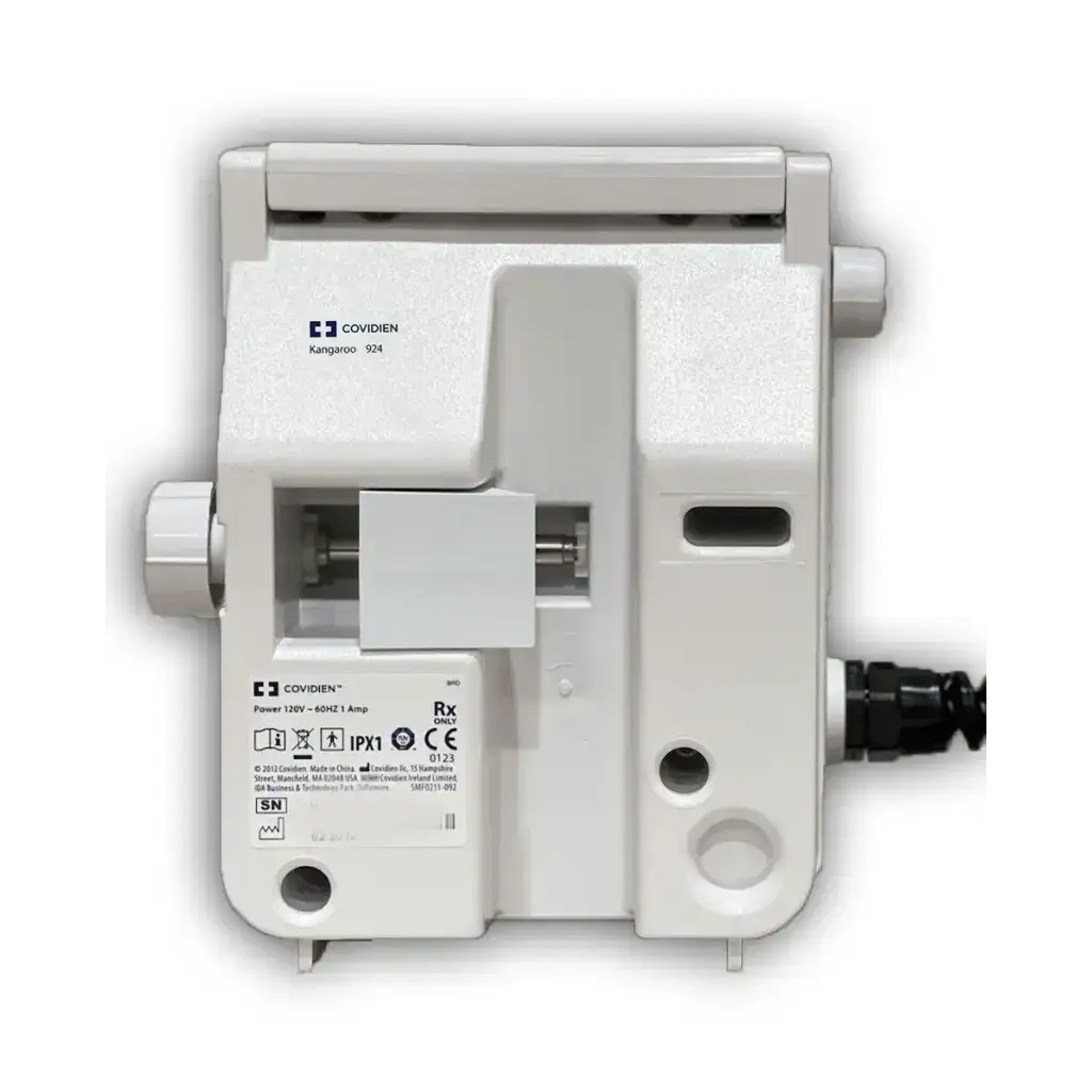 White plastic rectangular covidien kangaroo 924 enteral feeding pump with regulatory markings for feeding pump use
