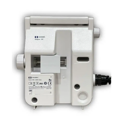 White plastic rectangular covidien kangaroo 924 enteral feeding pump with regulatory markings for feeding pump use
