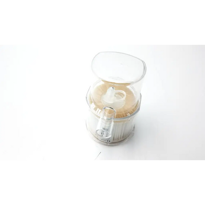 Clear plastic covidien puritan bennett d x800 expiratory filter with beige interior and transparent lid