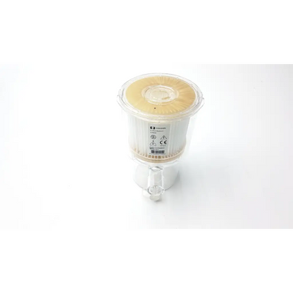 Clear plastic cylindrical covidien puritan bennett x800 expiratory filter with beige pleated media and transparent lid