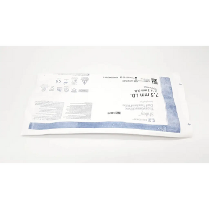 White sterile surgical drape with blue printed labeling and sealed edge for covidien shiley evac trachtubes 7.0 mm