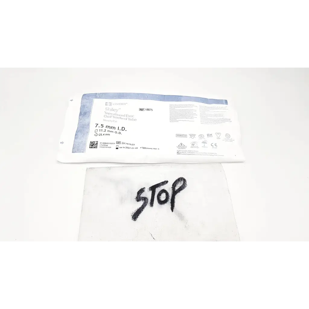 White sterile surgical drape with black stop on covidien shiley evac trachtubes taperguard cuff 7.0 mm product