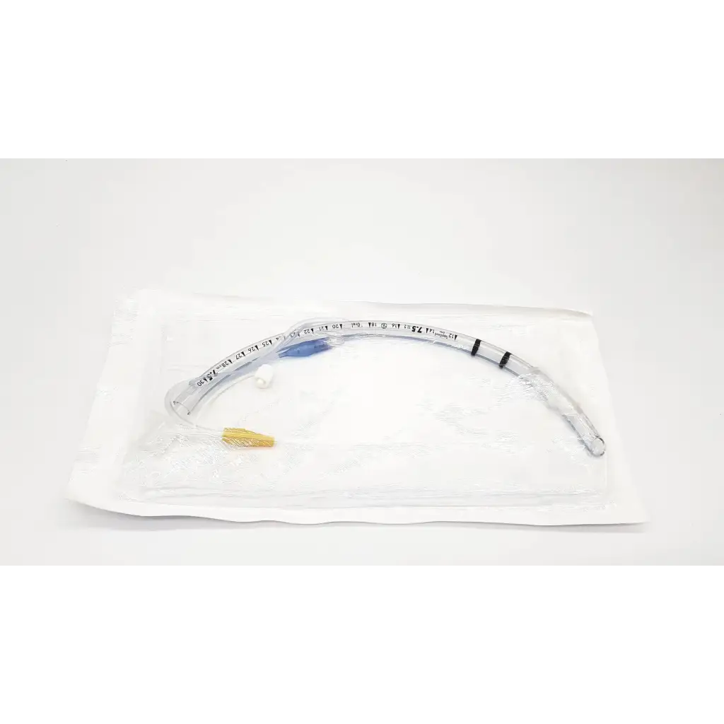 Clear plastic covidien shiley evac trachtube with blue and black markings and gold connector 7.0 mm taperguard cuff