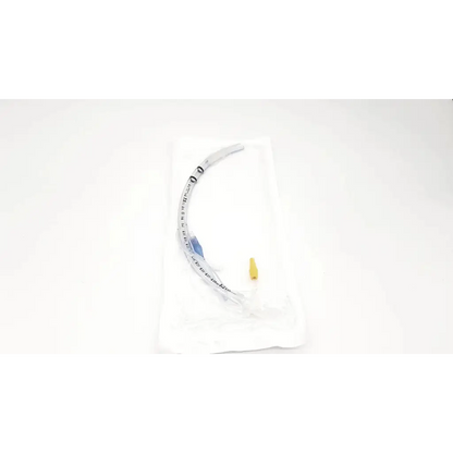 Transparent curved covidien shiley evac trachtubes airway tube with yellow tip blue markings 7.0 mm taperguard cuff