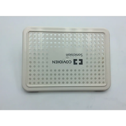 Beige plastic surgical sonicision case with a grid of circular perforations and covidien surgical sonicision logo