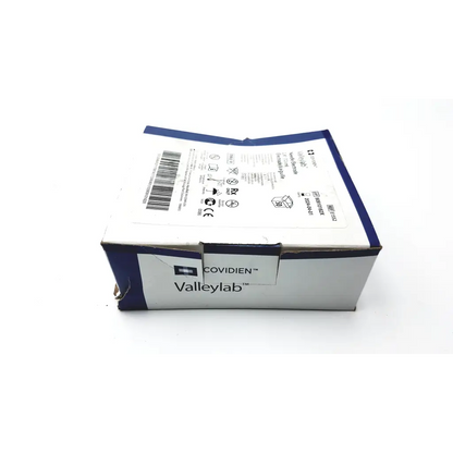 White and blue cardboard box of covidien valleylab needle 2.8 7.2 cm electrode e1552 with covidien valleylab branding