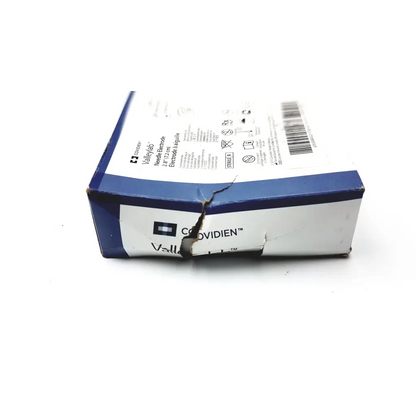 Blue and white cardboard box of covidien valleylab needle 2.8 electrode e1552 with visible crack on the side